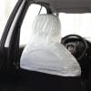 coprisedili bianchi in polietilene coreografica retro Coprisedile monouso bianco installato sul sedile auto vista posteriore