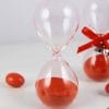 Mini clessidra in vetro con sabbia arancione per bomboniere eleganti