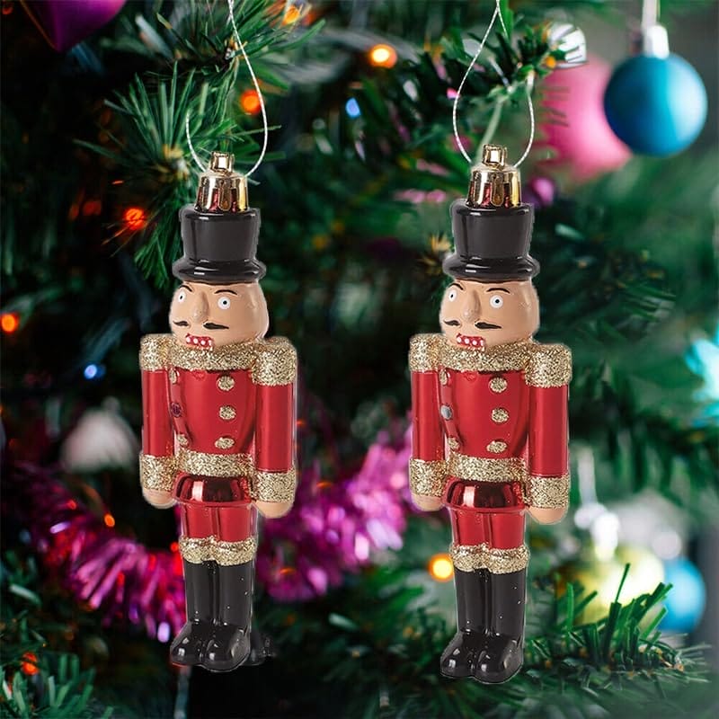 Soldatini Schiaccianoci 13 cm rossi con dettagli dorati per decorare l’albero di Natale