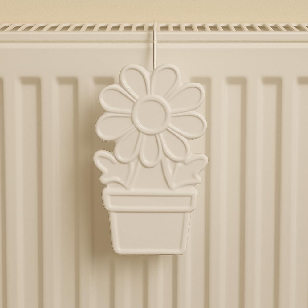 Evaporatore in ceramica a forma di fiore appeso al termosifone per umidificare l’ambiente