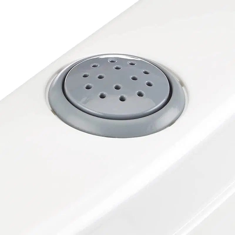 scarico-vasino-educativo-dolu Dettaglio vasino educativo Dolu bianco con seduta forata anti-schizzo per bambini