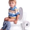 vasino-educativo-batteria Bambino seduto su vasino educativo Dolu bianco, ideale per imparare a usare il WC