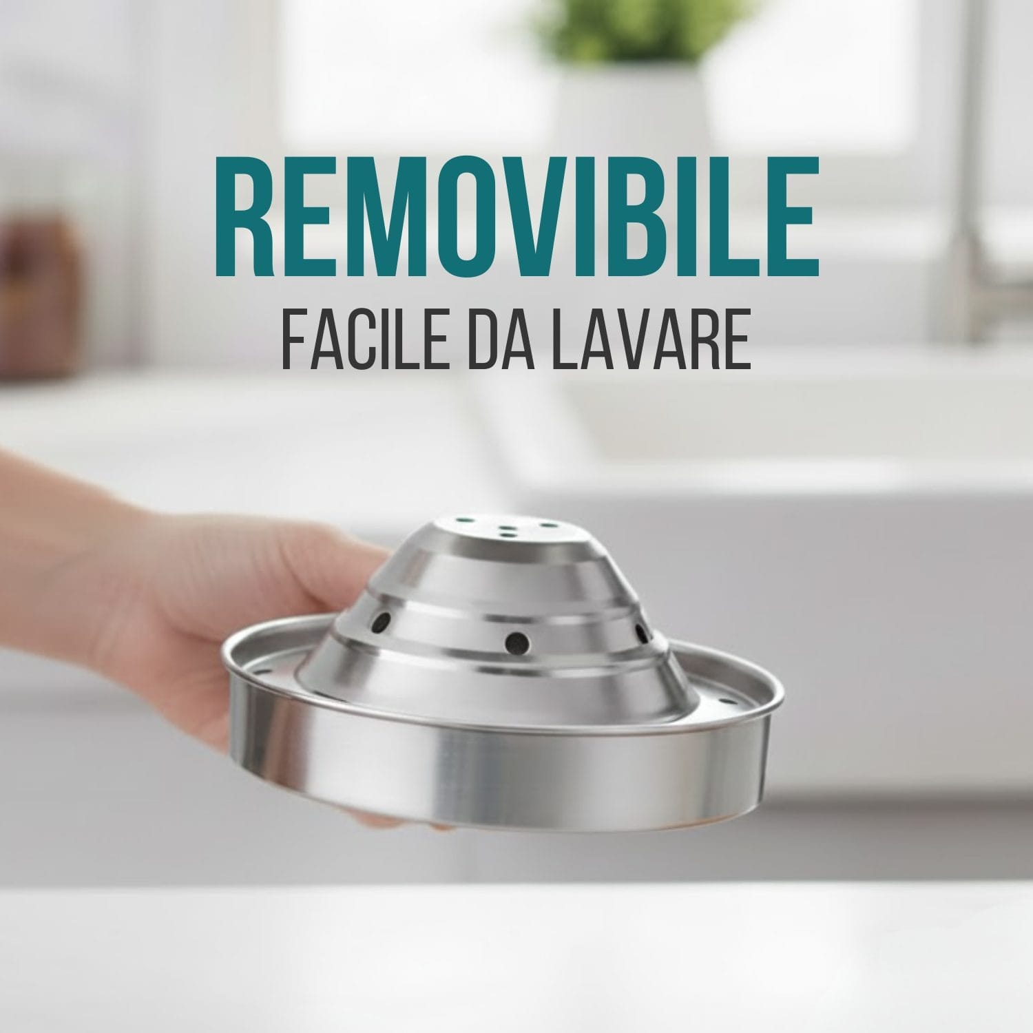 Dettaglio spremiagrumi manuale con componenti removibili in acciaio inox, facili da lavare